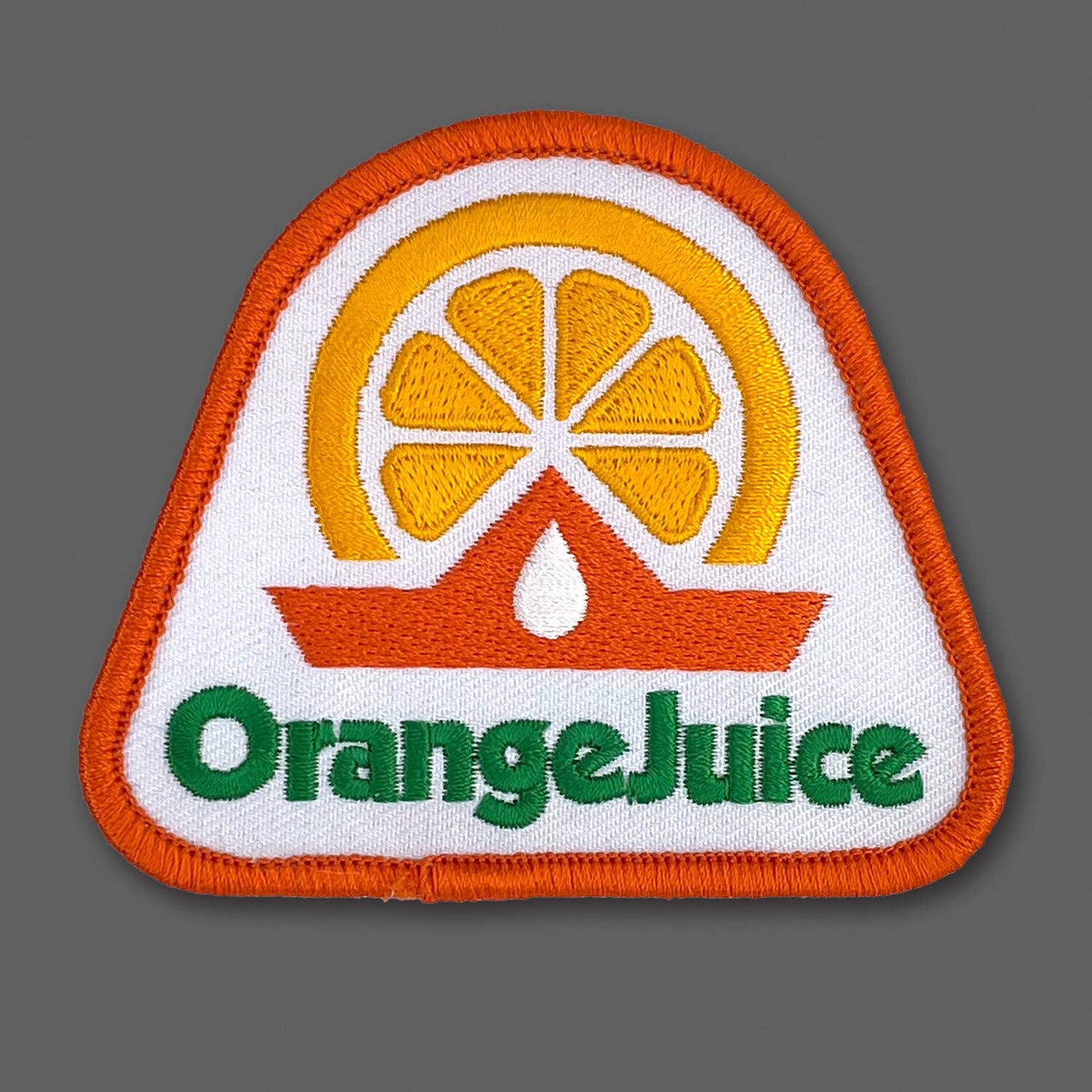 DDC-202 Orange Juice embroidered souvenir patch by Draplin Design Co.