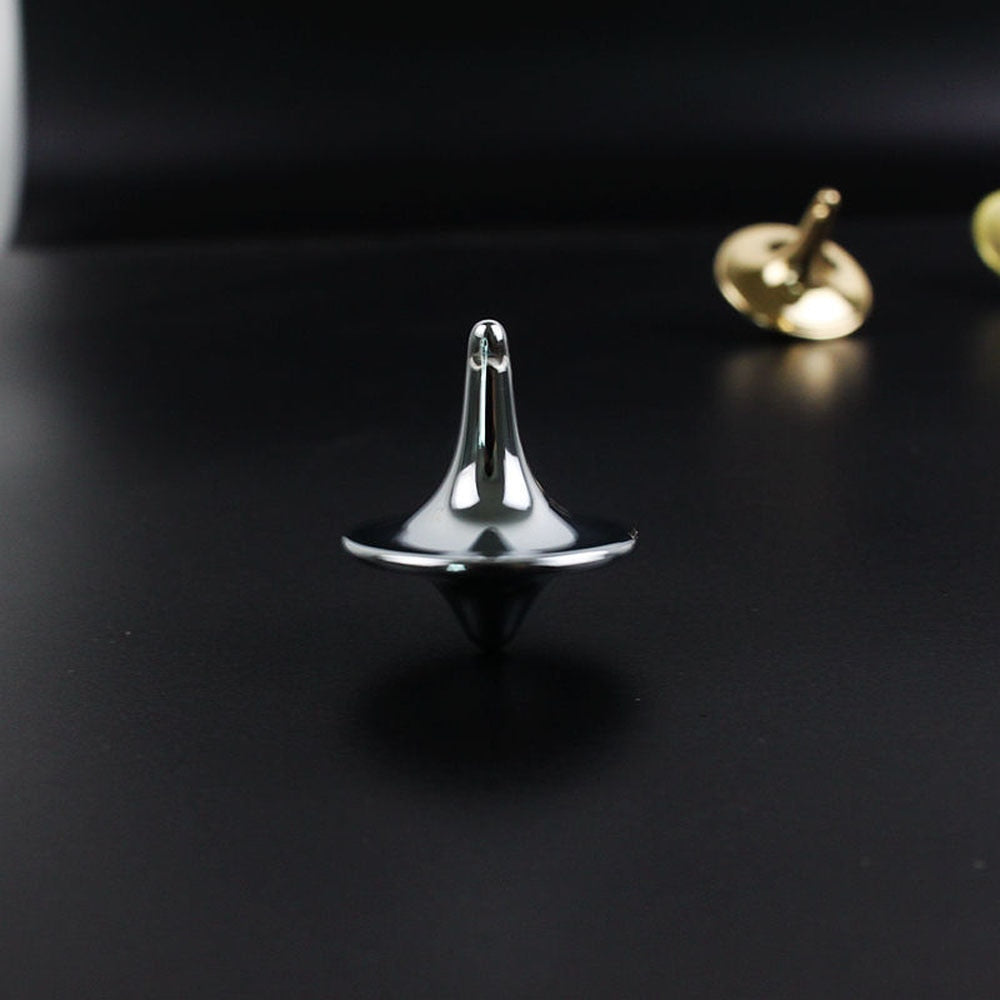 Timeless Metal Spinning Top