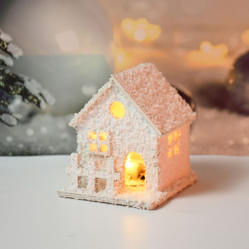 Cabañas de nieve iluminadas