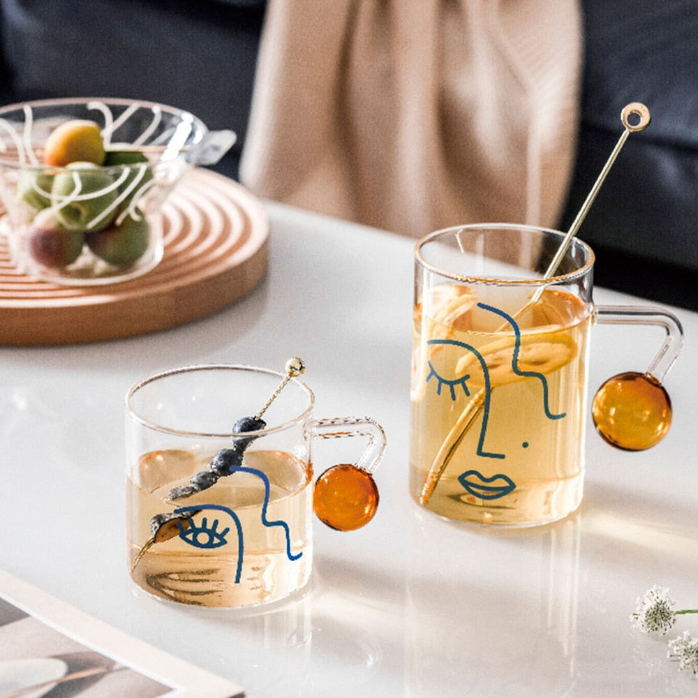 Tazas de vidrio posmodernas con asas de bola