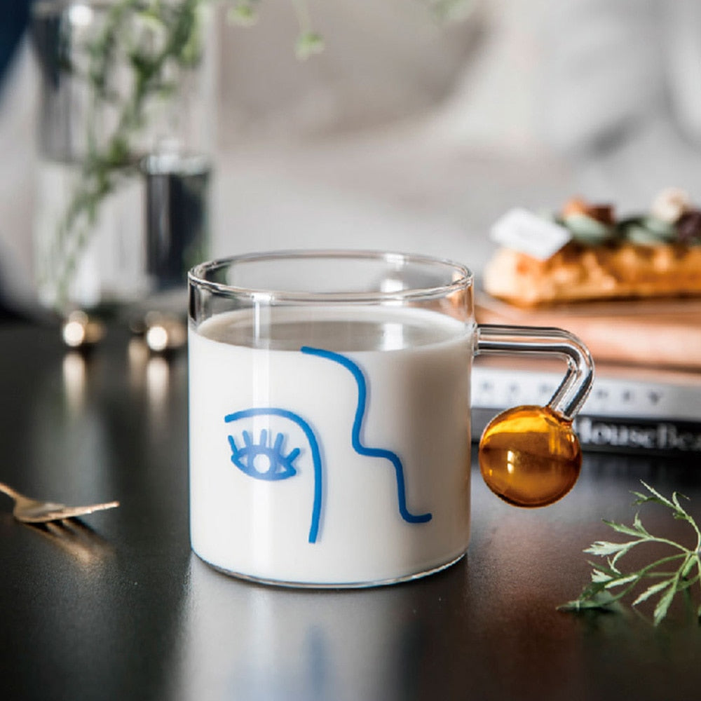 Tazas de vidrio posmodernas con asas de bola