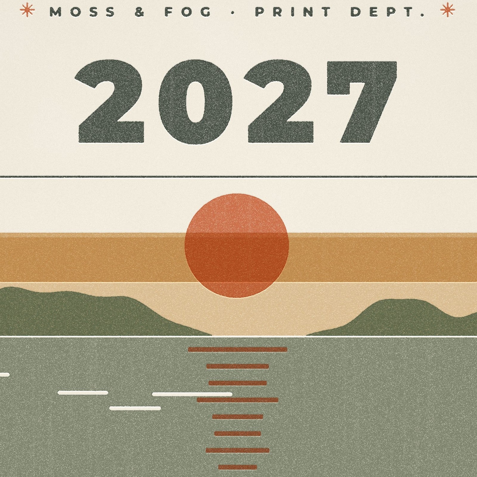 Close-up of the 2027 Moss and Fog calendar cover showing worn press type and paper grain