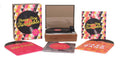 Teeny-Tiny Turntable, a miniature wooden record player with its lid open, beside its box and three small records in sleeves