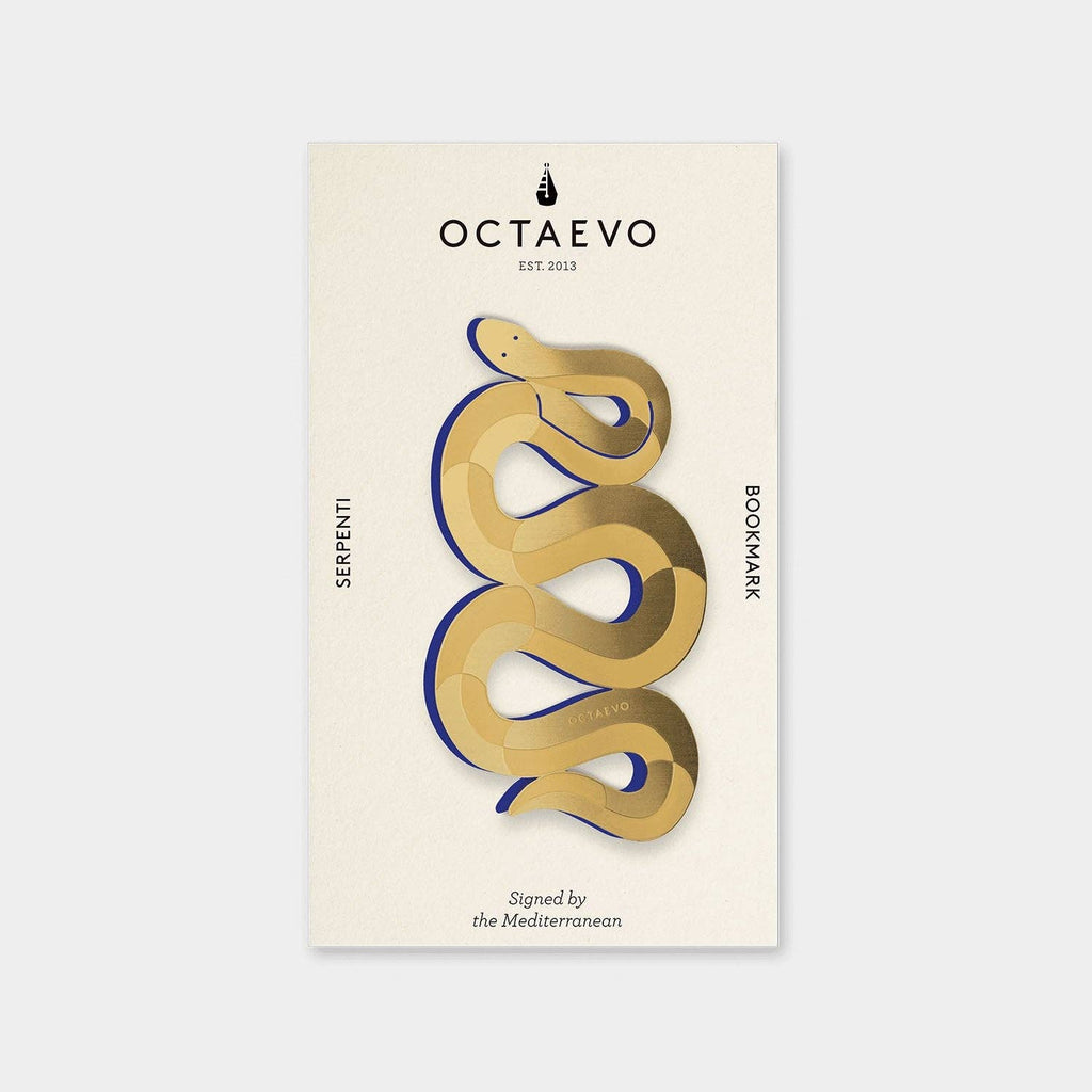 Serpenti brass bookmark by Octaevo, a die cut coiled snake in varnished brass on its postcard mount
