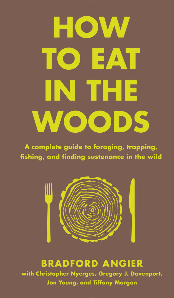 How to Eat in the Woods hardcover, brown cover with a yellow tree-ring plate between a fork and knife