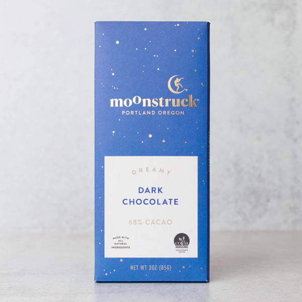 Moonstruck Dreamy Dark Chocolate bar, 68% cacao, in a deep blue wrapper flecked with gold stars