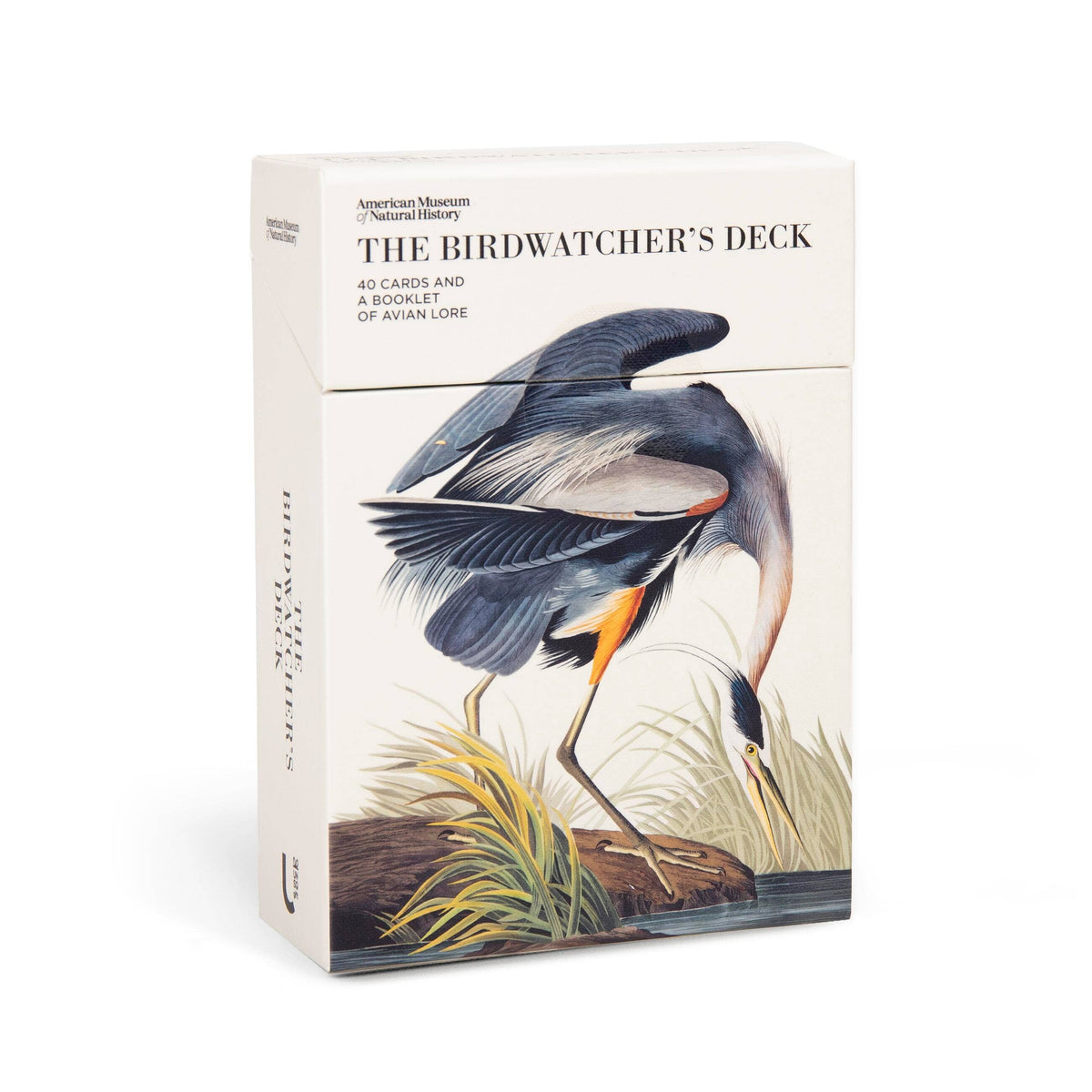 The Birdwatcher's Deck box, cream with a detailed painting of a great blue heron stepping through reeds