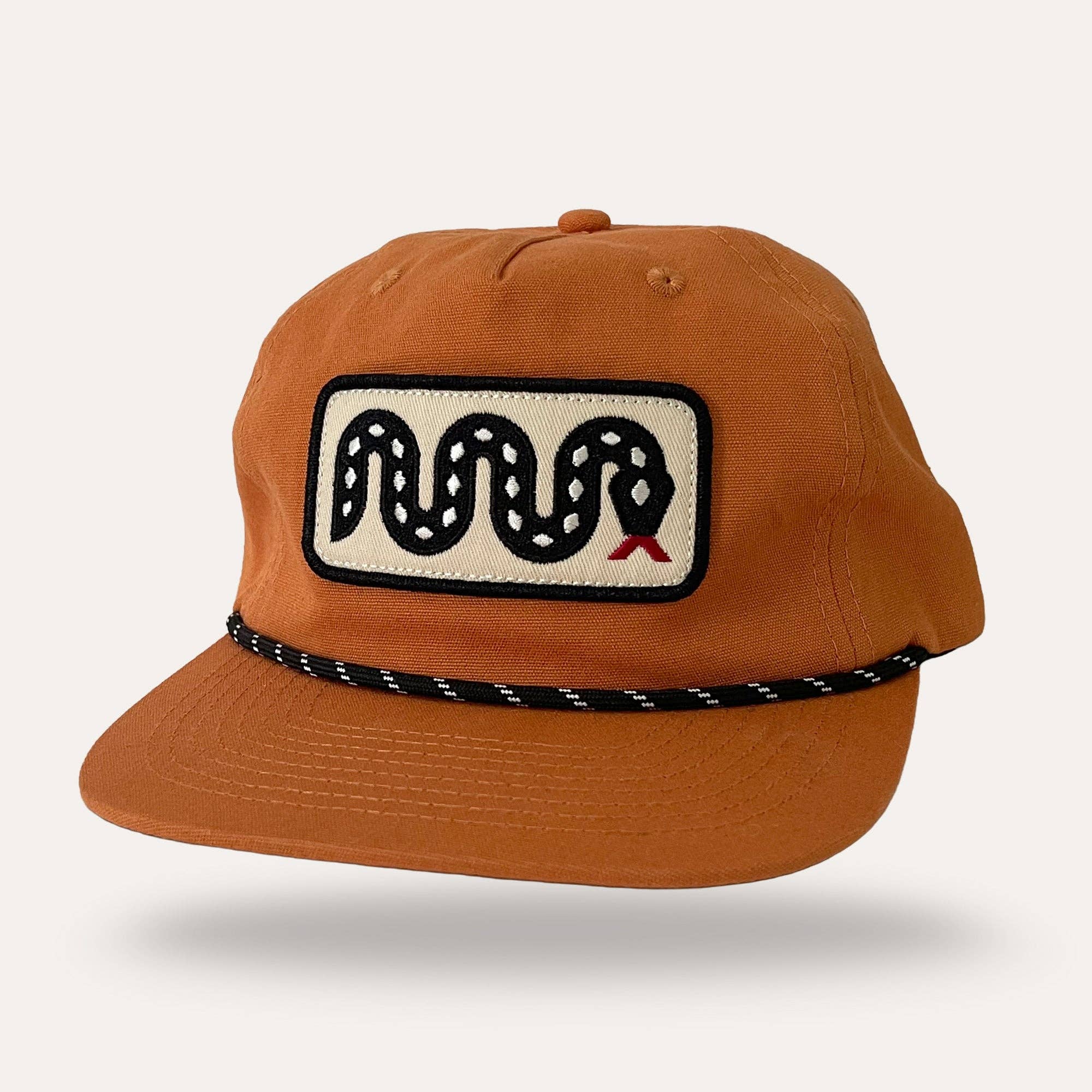 Snake Hat in desert orange, from Sunday Lounge