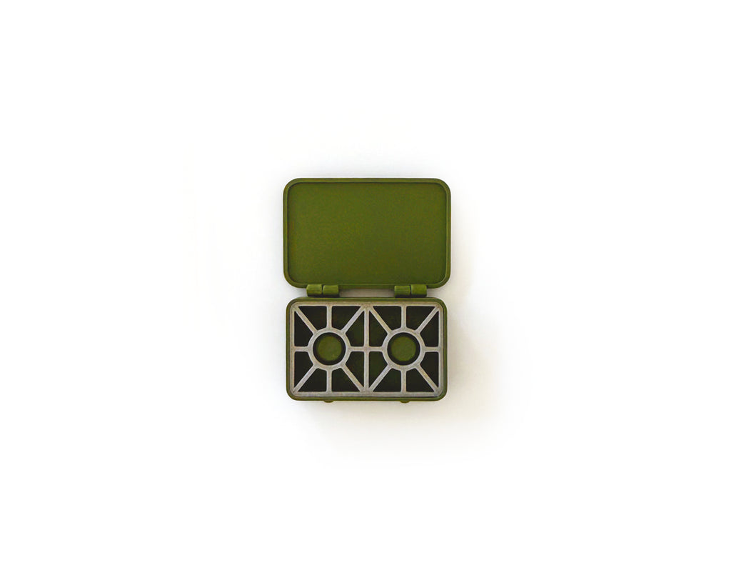 Miniature olive two burner camp stove with its lid open, from the 15 piece camping set