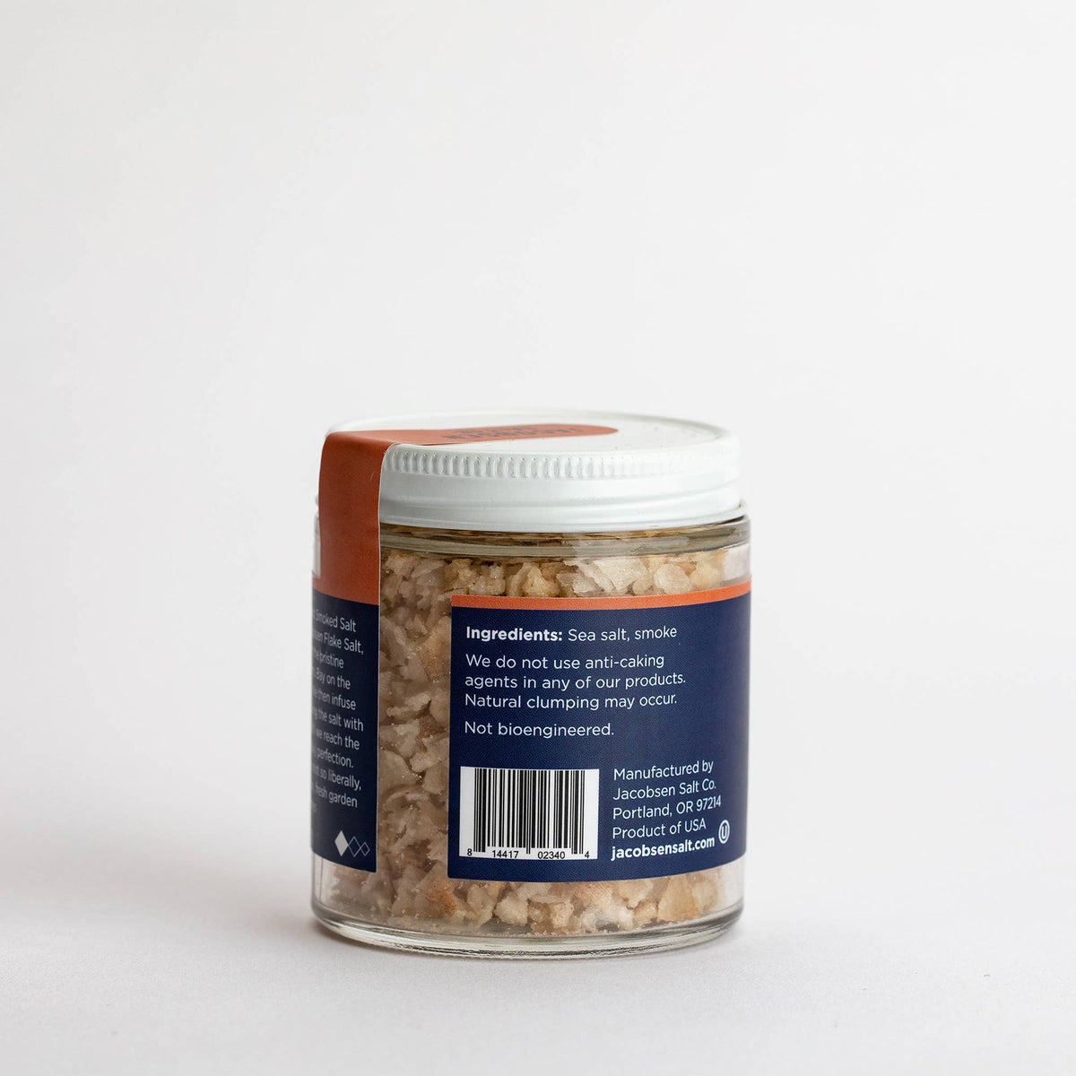 Back of the Jacobsen Cherrywood Smoked Salt jar showing the ingredients label, sea salt and smoke