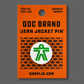 DDC-247 Human white enamel jean jacket pin by Draplin Design Co.