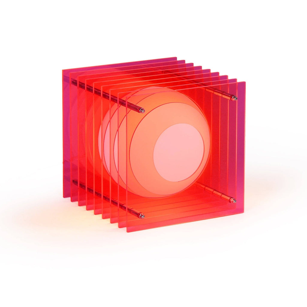 BANG Lop light in electric pink cast acrylic, stacked sheets glowing around a warm central disc