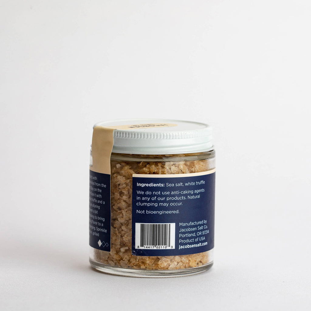 Back of the Jacobsen White Truffle Salt jar showing the ingredients label, sea salt and white truffle