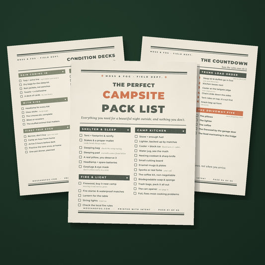 The Perfect Campsite Pack List by Moss and Fog, letterpress style printable checklist pages fanned on deep green