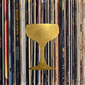 Booze & Vinyl cover: a gold coupe glass silhouette over a wall of record spines