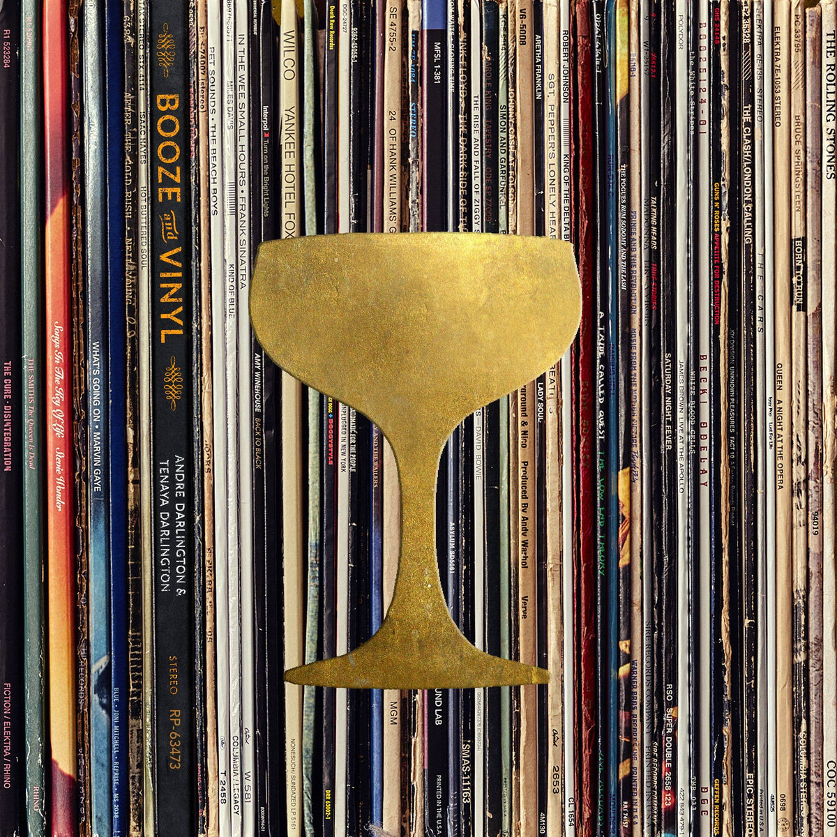 Booze & Vinyl cover: a gold coupe glass silhouette over a wall of record spines