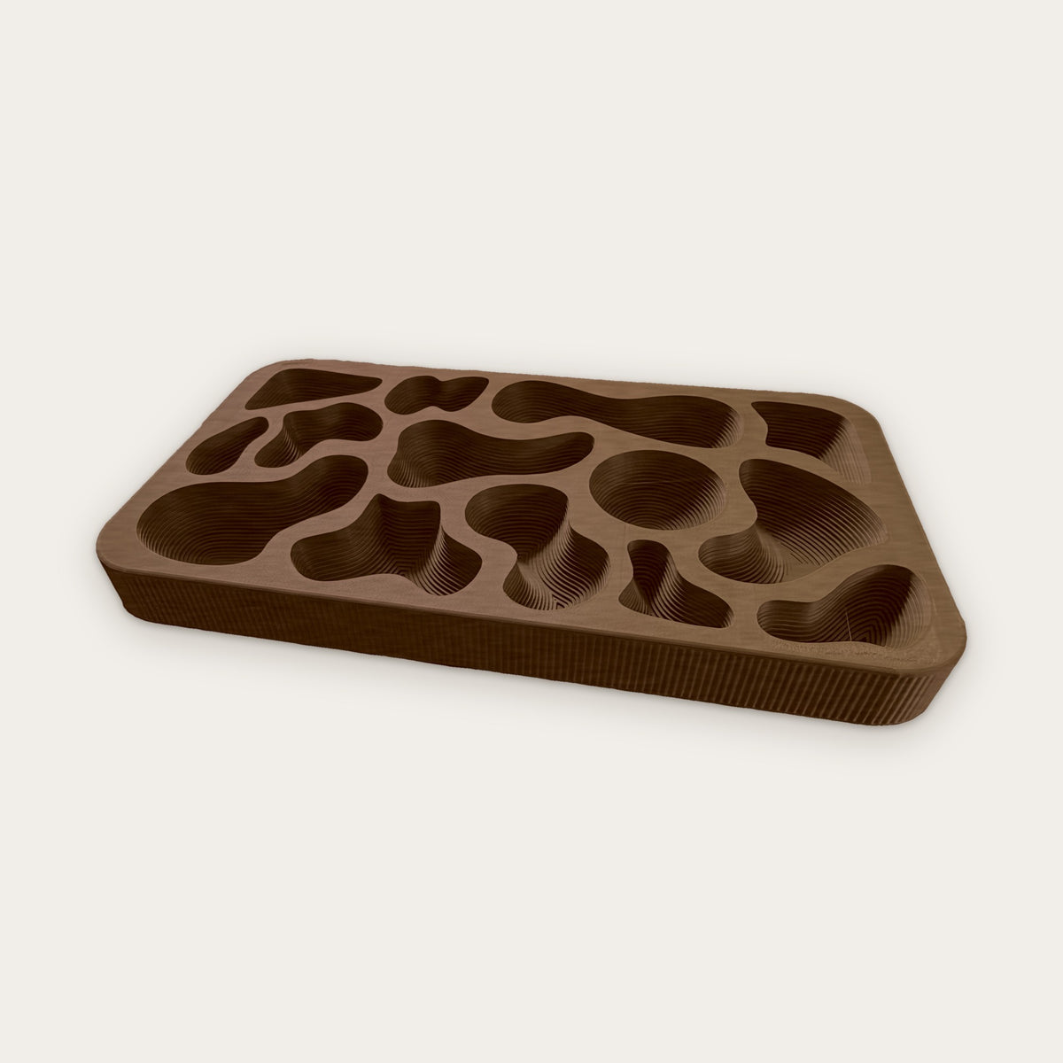 Topography Tray in Walnut, a wood filled finish with soft grain, terraced wells and fluted sides