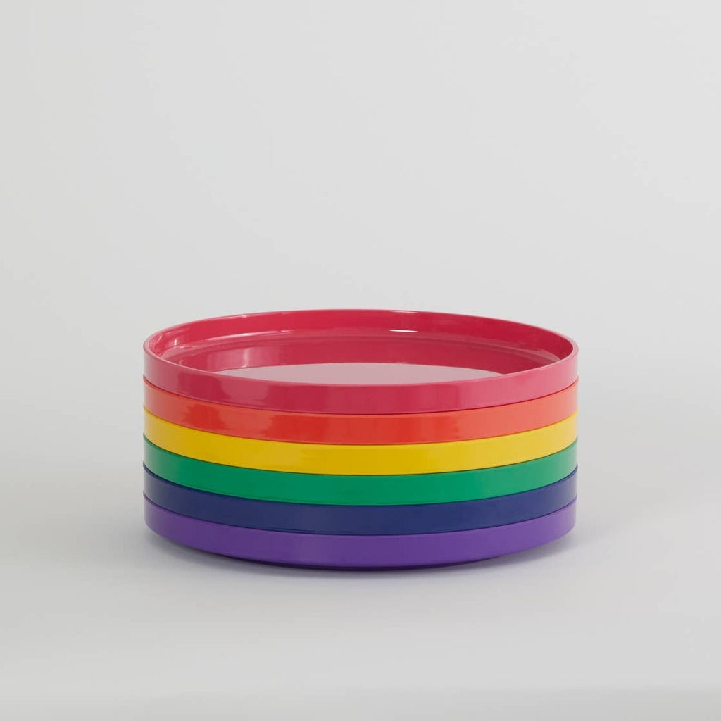 A stack of six Max Dinnerware small plates by Heller in red, pink, yellow, green, blue and purple