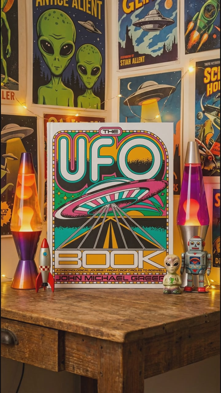 The UFO Book on a desk in a space themed bedroom with a lava lamp, short video