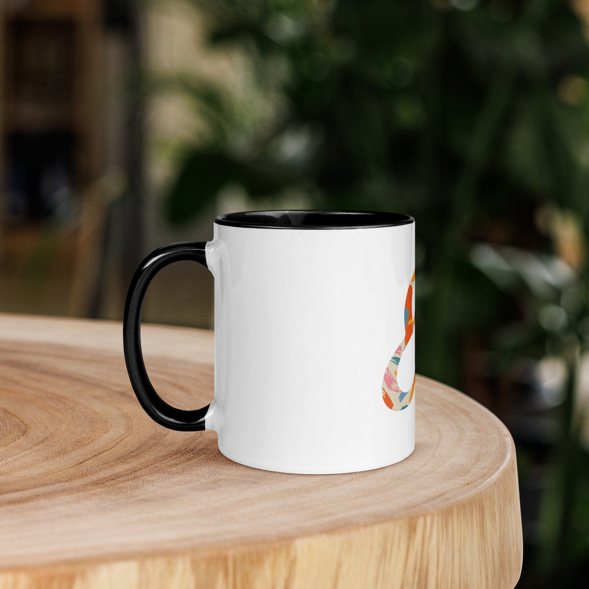 11 ounce Painted Ampersand mug in black, handle on the left
