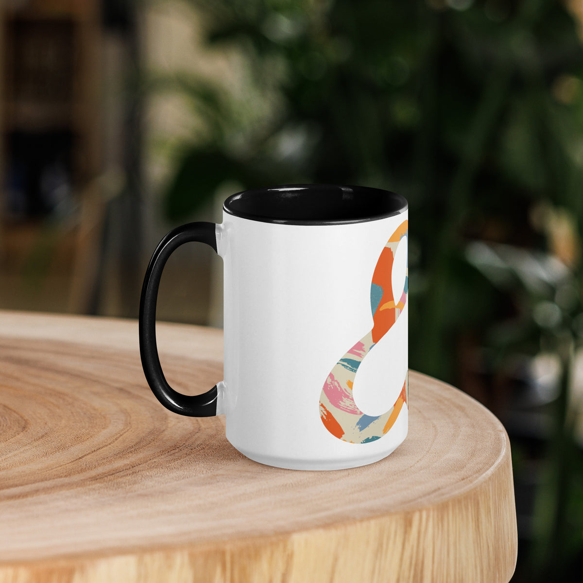 15 ounce Painted Ampersand mug in black, handle on the left