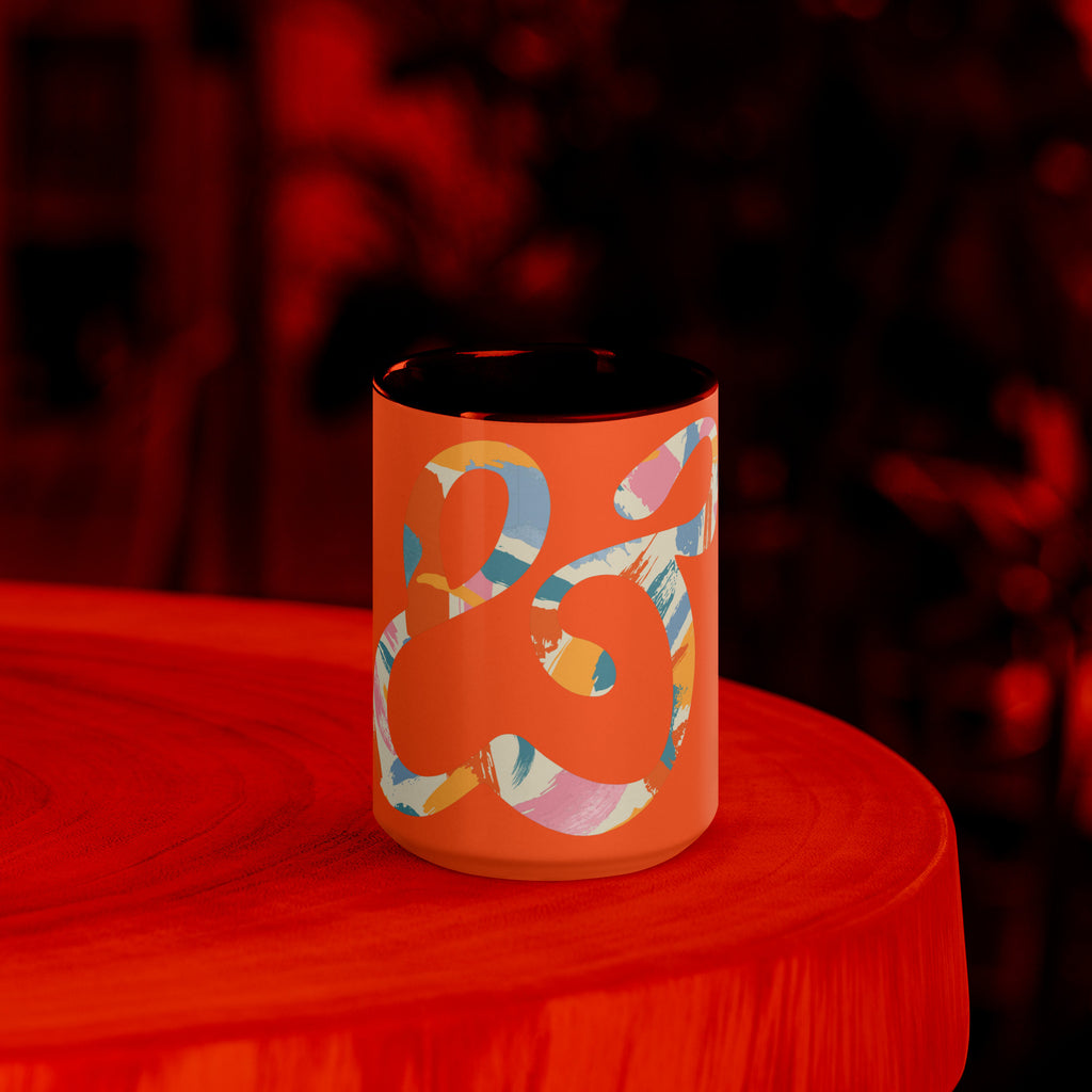 15 ounce Painted Ampersand mug with an orange inside, front view