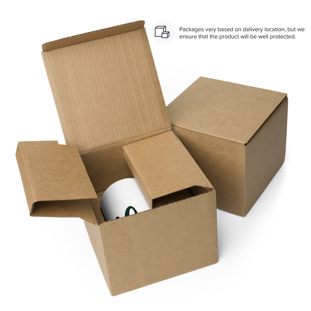 Moss and Fog Wordmark Mug packed in its cardboard shipping box